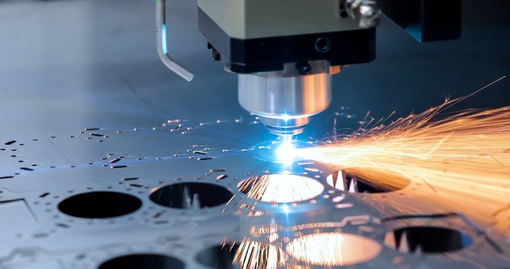 Closeup of CNC machine with sparks