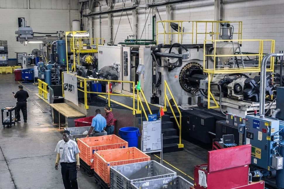 People working on low volume injection molding