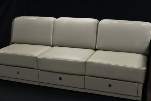 A leather appointed aerospace Divan. 