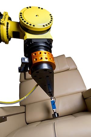 Image of a robot testing a chair for an automotive testing and development services facility | RCO Engineering Image of a robot testing a chair for an automotive testing and development services facility | RCO Engineering