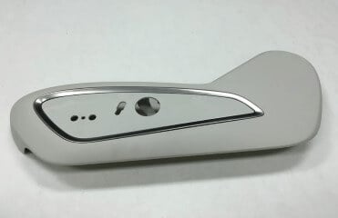 A seat side shield made by low volume plastic injection molding service